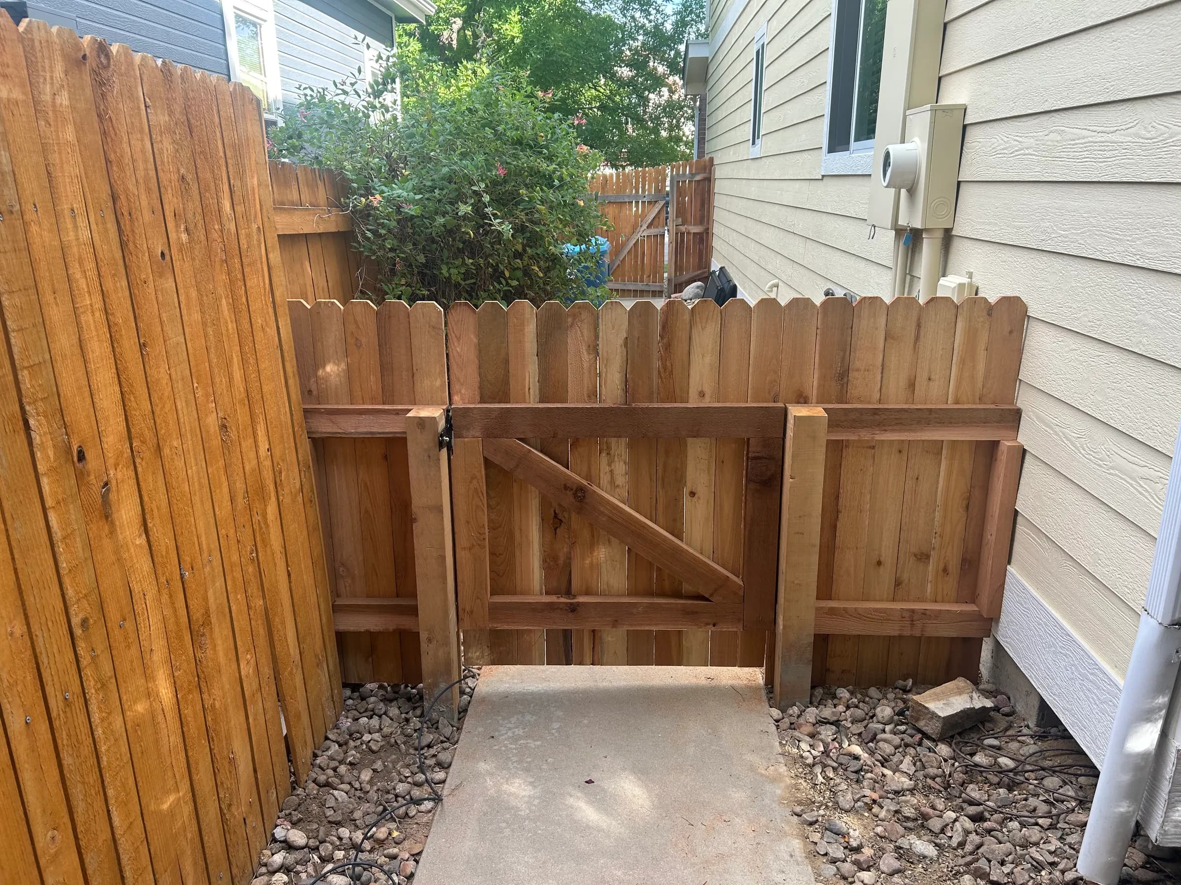 Cedar side-yard gate set into a cedar fence